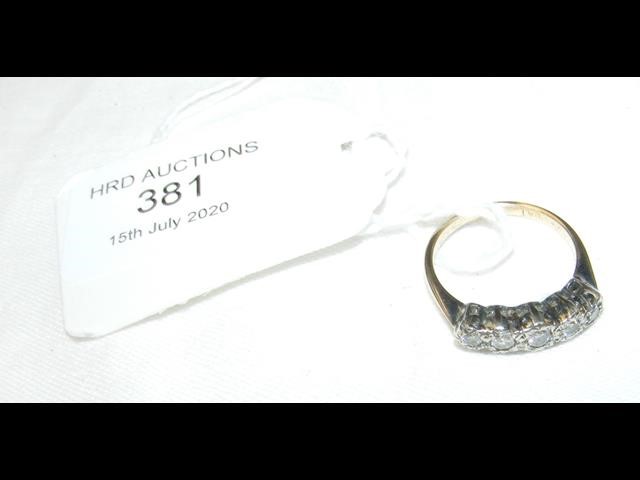 A five stone diamond ring in gold setting