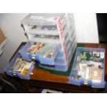 Six drawer unit of various model train kits and pa