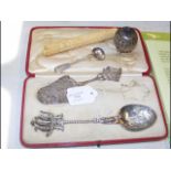 A Dutch silver spoon, carved ivory needle case etc