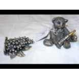 Two filled silver paperweight models of a Teddy Be