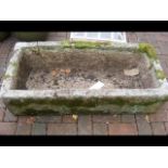 An antique stone trough - 104cm x 48cm