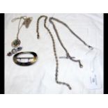 A silver watch chain, buckle, etc.