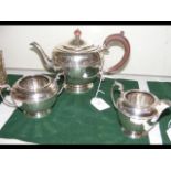 A three piece silver teaset with Birmingham hallma