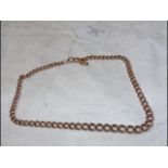 A gold watch chain