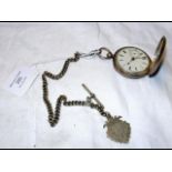 A silver hunter pocket watch with chain