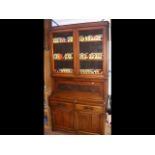 An Edwardian secretaire cabinet sporting drop-down