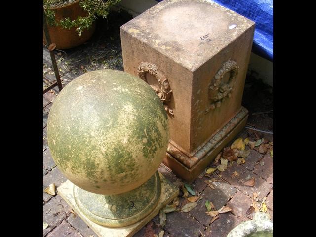 A garden plinth, together with a circular finial