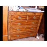 A 19th century mahogany chest of drawers with ivor