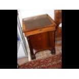 A William IV rosewood Davenport desk with brass ga