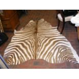 An old Zebra rug