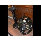 A Chinese black lacquered pot stand together with