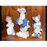 An assortment of five Lladro and 'Nao by Lladro' f