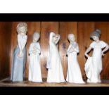 A cluster of five 'Nao by Lladro' figurines, inclu