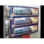 A boxed Bachmann diesel locomotive, together with