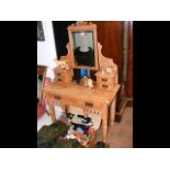 An antique pine dressing table