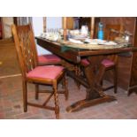 A refectory table with pierced heart supports, tog