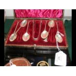 A cased set of silver teaspoons and sugar tongs