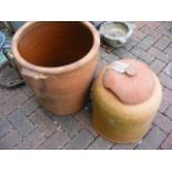 An old terracotta rhubarb forcer, together with a