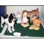 A Beswick dog ornament, together with four others