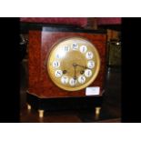 An antique french-style mantle clock with striking