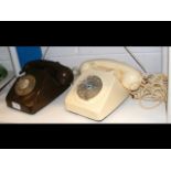 Two rotary-dial telephones