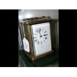 A French brass cased carriage clock - 14cm high wi