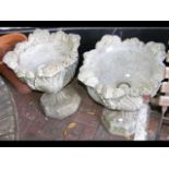 A pair of attractive garden urns on stands - 60cm