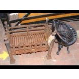 A cast iron dog grate and one other