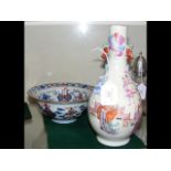 A 24cm high antique oriental vase with hand painte