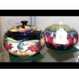 A Moorcroft pottery jar and cover and one other