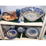 A mass of blue & white glazed tableware - on two s