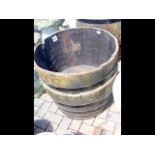 Two wooden and metal bound barrel planters - 68cm