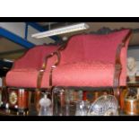 Two Edwardian tub chairs upholstered in red