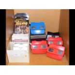 A stock of view master slides, alongside 6 vintage