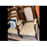 A pair of Edwardian inlaid armchairs