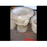 A classical shaped 65cm high garden urn on stand