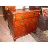 Antique mahogany chest with fold-over top and cupb