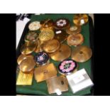 A tray of collectable compacts