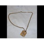 A gold 'envelope' locket on chain