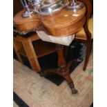A Victorian kidney shaped table with slide under