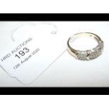 A diamond ring in 10ct gold setting