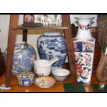 A medley of oriental ginger jars, vases, bowls and