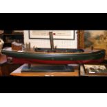 A scratch built wooden 'live' steamboat on stand -