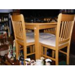 A hardwood extending dining table together with th