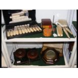 A canteen, various brushes, cufflinks, barometer,