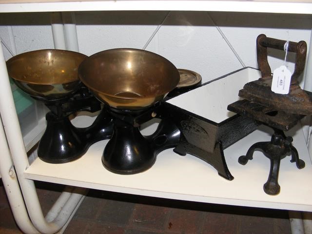 Two pairs of kitchen scales, a small cast iron tro