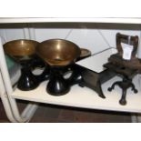 Two pairs of kitchen scales, a small cast iron tro