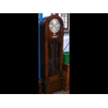 A 1930's oak cased three train Grandfather clock