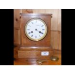 A Charles Frodsham oak cased mantel clock with two