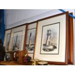 A quintent of framed printed lighthouse pictures